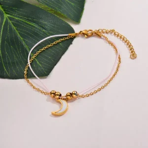 Pulsera dorada con luna y cordón rosa